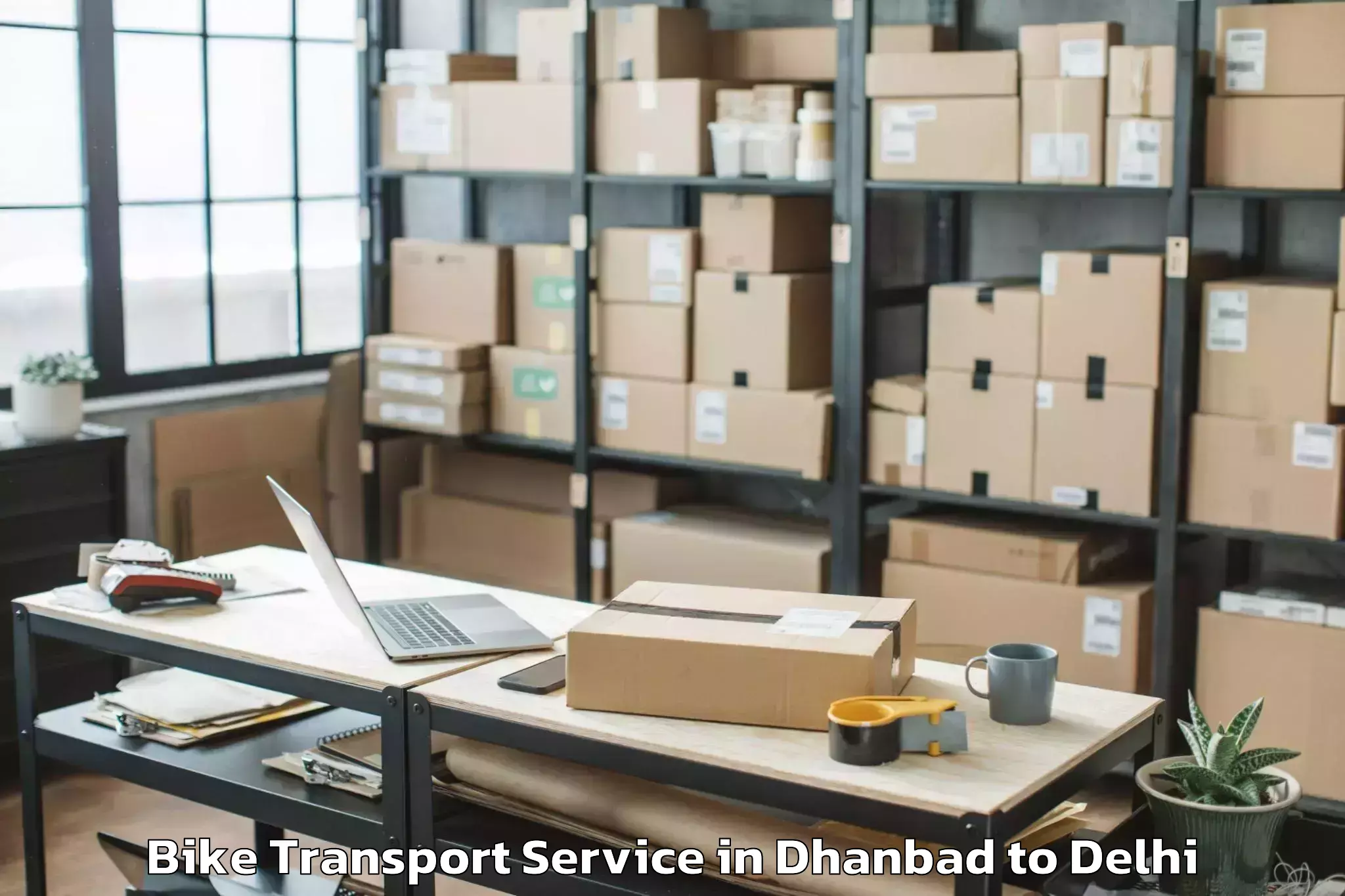 Book Dhanbad to V3s East Centre Mall Bike Transport Online